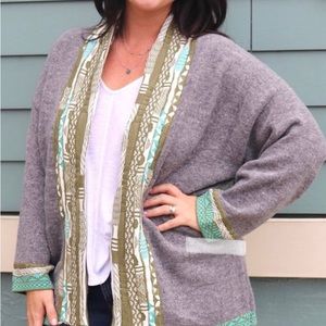 Grey cardigan with green, turquoise, and cream detail